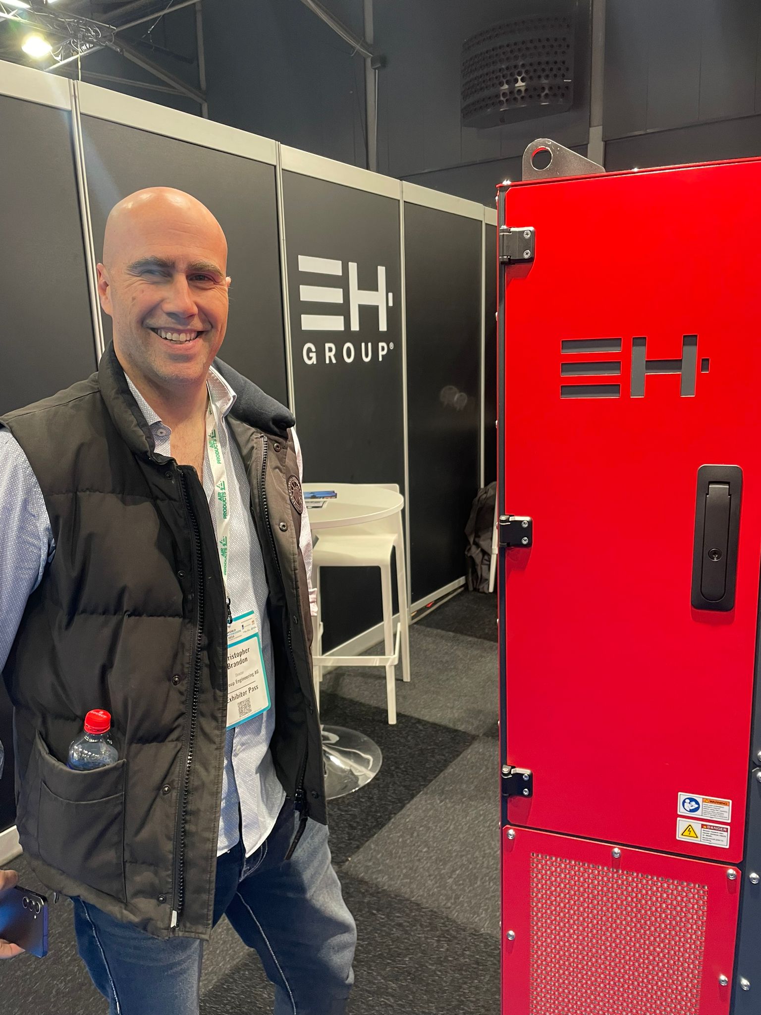 Christopher Brandon, CEO EH Group and GH2 board member, next to their new PEM 250 KW system, ready to for example supply data centres and large vessels with backup power.